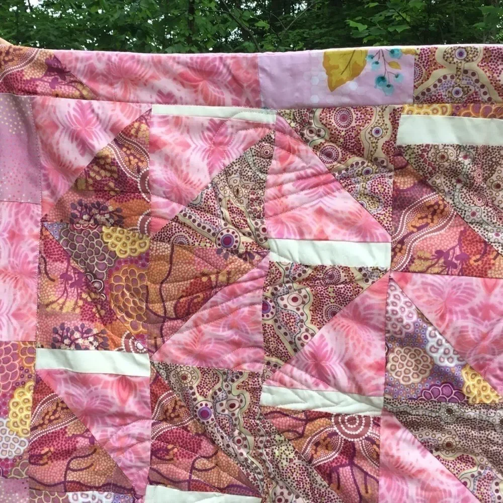 NWT. Hand Crafted Pinks Aboriginal Prints Quilt